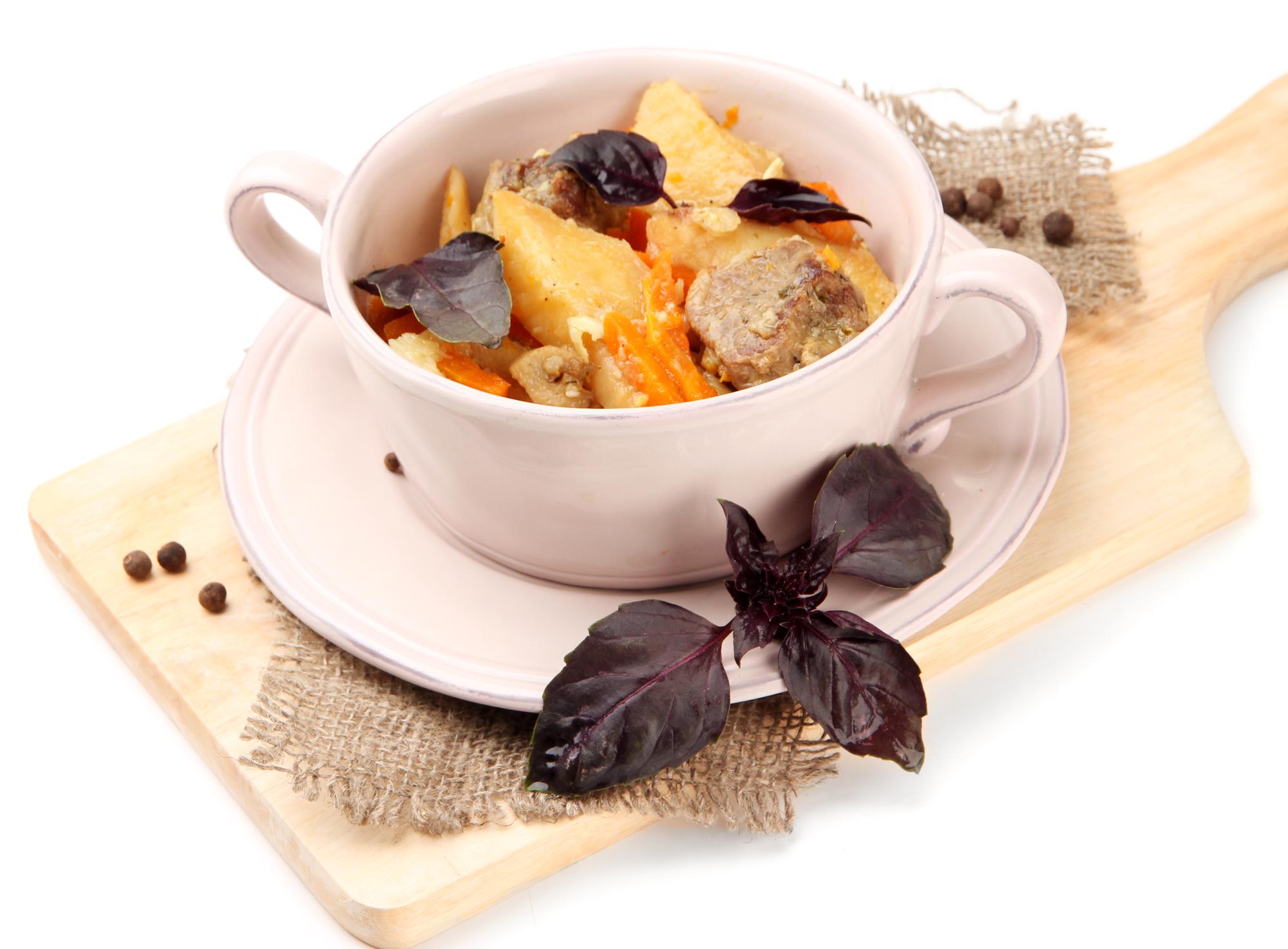 bowl of hearty stew with herbs
